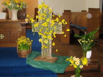 The cross bursts into life
